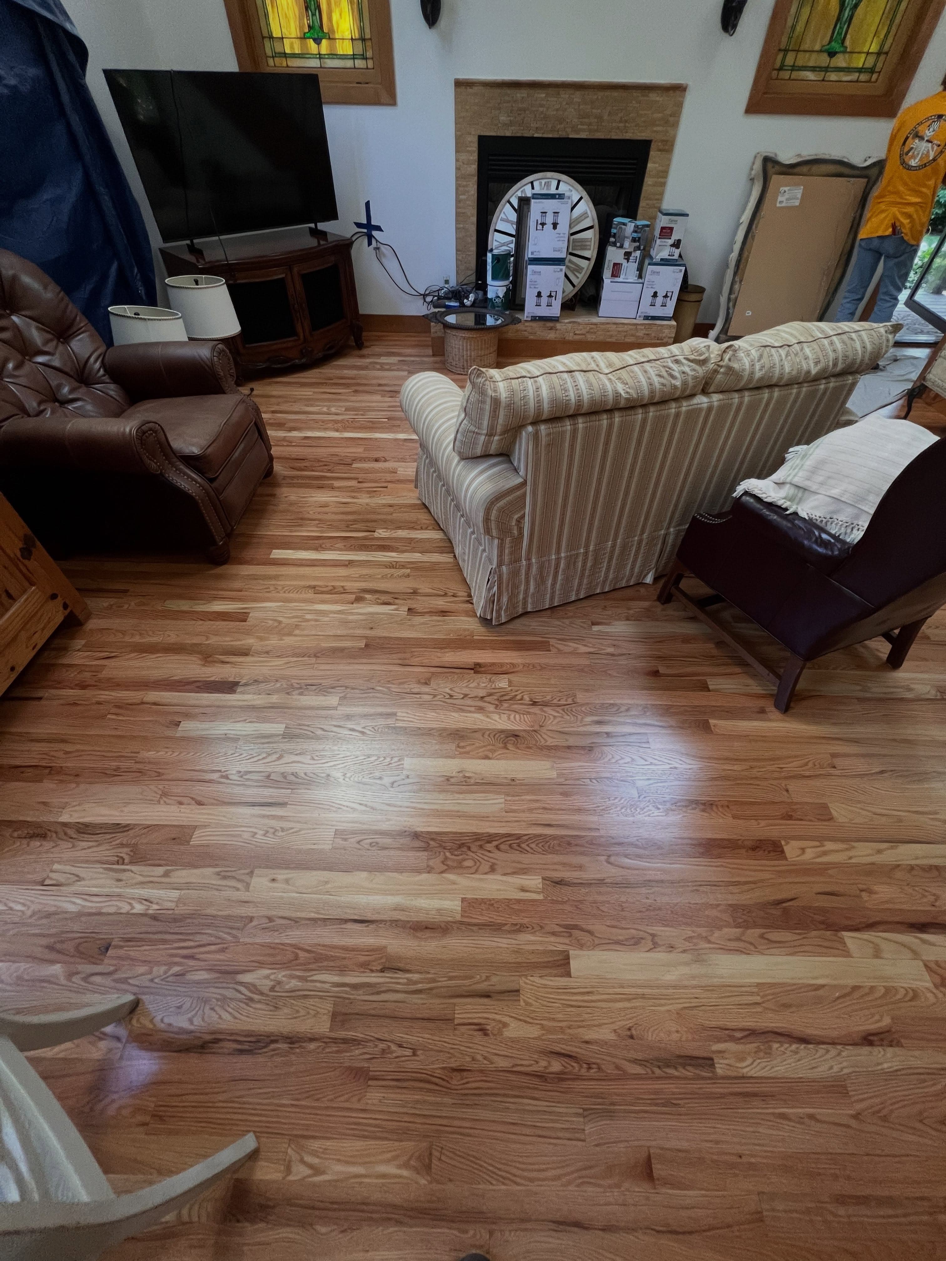 Showroom-style interior with warm hardwood flooring throughout